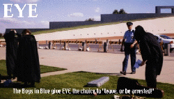 photo of EYE being threatened with arrest by Parliament House security.